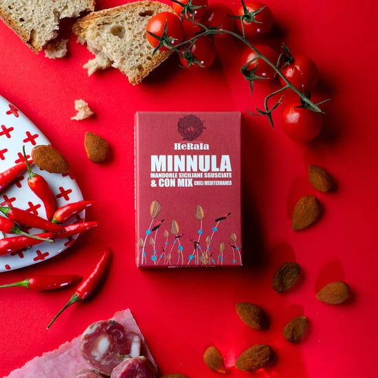 Spicy minnula - Sicilian almonds shelled and with a mix of Mediterranean chili